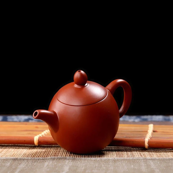 120ml 9 - hole Yixing Handmade Red Clay Teapot / Xishi Longdan Teapot/filtered Small Bubble Teapot - China Tea Store